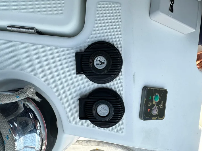 Lucky Yacht Photos Pics Control panel on 2014 Beneteau Oceanis 45 yacht with Harken winch and buttons.