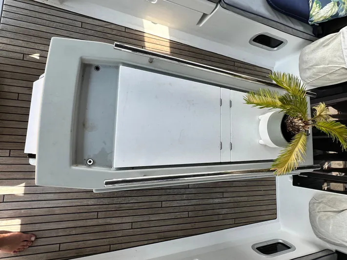 Lucky Yacht Photos Pics Beneteau Oceanis 45 yacht deck with wooden flooring and potted plant, 2014 model.