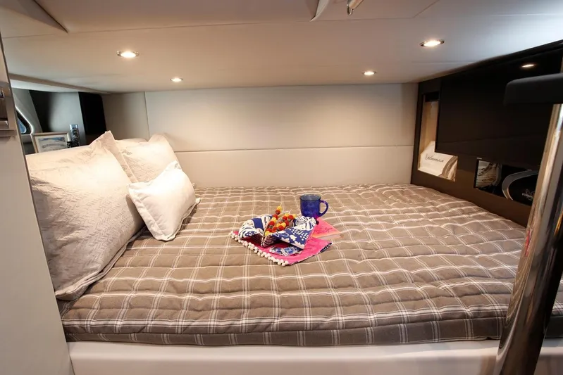  Yacht Photos Pics Manufacturer Provided Image: Cozy cabin interior of 2026 Formula 380 Super Sport Crossover OB with bed and decor.
