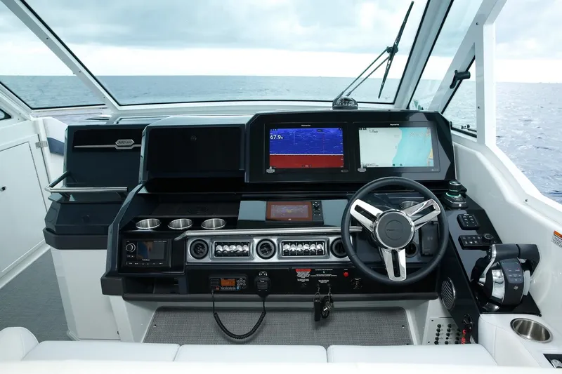  Yacht Photos Pics Manufacturer Provided Image: 2026 Formula 380 Super Sport Crossover OB cockpit with advanced navigation displays and controls.
