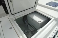 Storage compartment on a 2017 Leopard 45 catamaran with ropes and equipment.