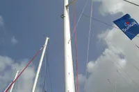 Leopard 45 sailboat mast and rigging against a cloudy sky, 2017 model.