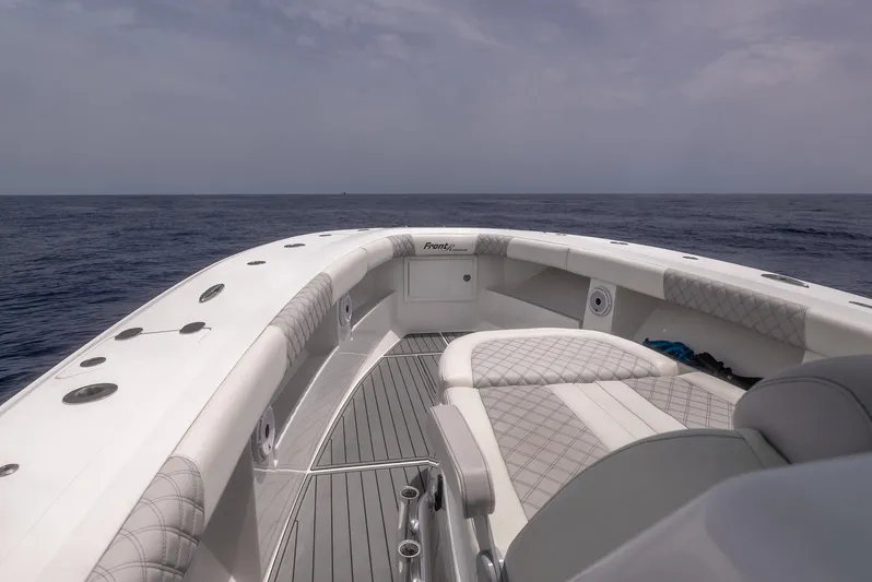 Bluefin Tales Yacht Photos Pics 2021 Front Runner 39 Center Console boat on open sea, featuring spacious deck and seating.