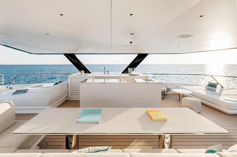 Reduce Yacht Photos Pics Luxurious 2024 Silver Yachts SilverCat 36M yacht interior with ocean view and elegant seating.