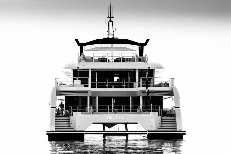 Reduce Yacht Photos Pics 2024 Silver Yachts SilverCat 36M luxury yacht, rear view on calm water.