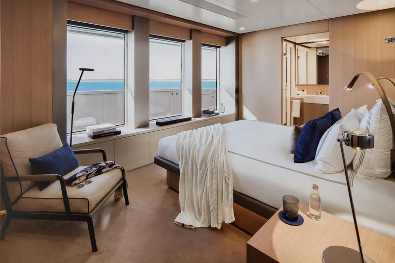Reduce Yacht Photos Pics Luxurious bedroom interior of 2024 Silver Yachts SilverCat 36M with ocean view.
