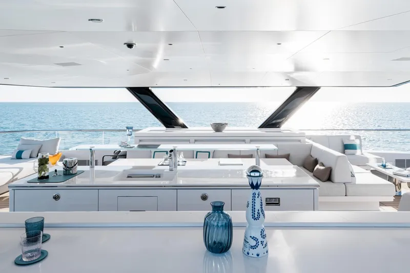 Reduce Yacht Photos Pics Luxurious 2024 Silver Yachts SilverCat 36M yacht interior with ocean view and elegant seating area.