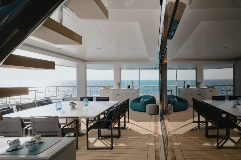 Reduce Yacht Photos Pics Luxurious 2024 Silver Yachts SilverCat 36M interior with ocean view and elegant seating area.