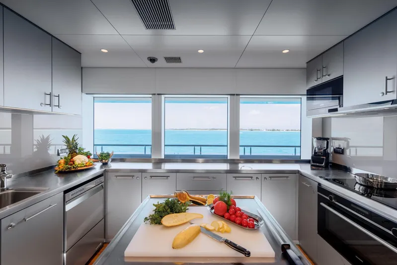 Reduce Yacht Photos Pics Modern kitchen on Silver Yachts SilverCat 36M, 2024, with ocean view and fresh produce.