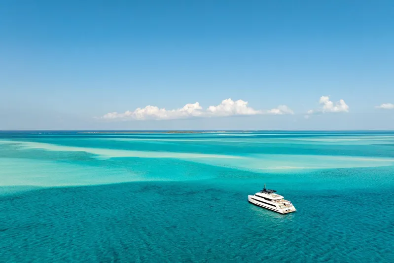 Reduce Yacht Photos Pics Luxury Silver Yachts SilverCat 36M 2024 cruising in turquoise ocean waters.