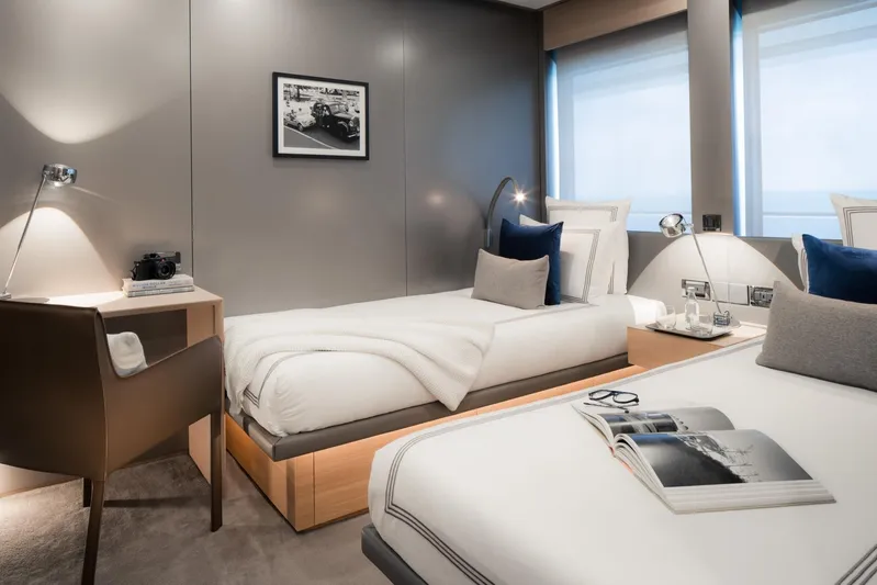 Reduce Yacht Photos Pics Luxurious bedroom interior on 2024 Silver Yachts SilverCat 36M, featuring modern decor and cozy beds.