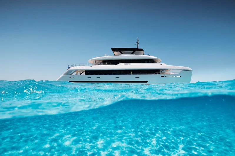 Reduce Yacht Photos Pics 2024 Silver Yachts SilverCat 36M luxury yacht on clear blue ocean waters.