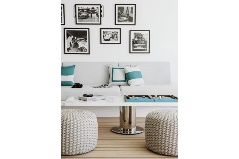 Reduce Yacht Photos Pics Luxurious interior of 2024 Silver Yachts SilverCat 36M with modern decor and framed photos.