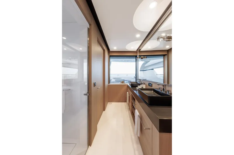 Reduce Yacht Photos Pics Luxurious bathroom interior of 2024 Silver Yachts SilverCat 36M, featuring modern fixtures and ocean view.