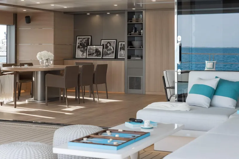 Reduce Yacht Photos Pics Luxurious interior of 2024 Silver Yachts SilverCat 36M, featuring elegant dining and ocean views.