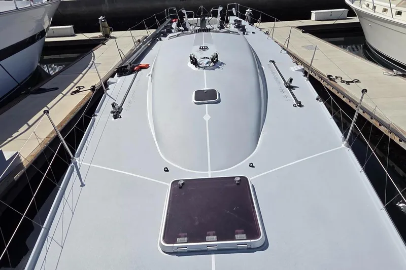 Peligroso Yacht Photos Pics Dencho Marine Kernan 68 yacht, 2005 model, docked at a marina.