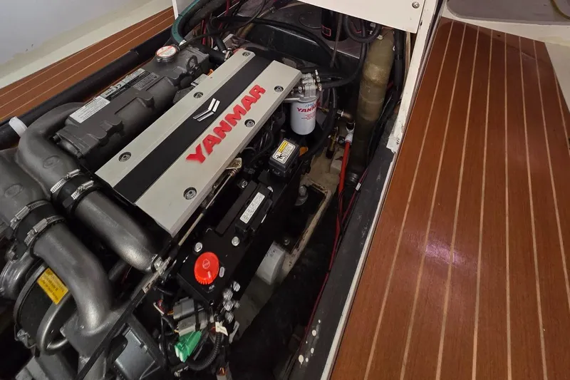 Peligroso Yacht Photos Pics Yanmar engine in 2005 Dencho Marine Kernan 68 yacht, showcasing detailed mechanical components.