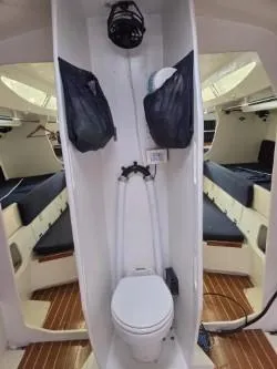 Peligroso Yacht Photos Pics Dencho Marine Kernan 68 yacht interior with toilet, 2005 model, featuring wooden flooring.