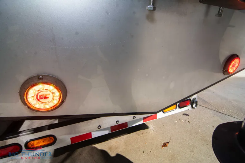  Yacht Photos Pics Close-up of 2021 Fountain 38 SC boat trailer lights and reflectors.