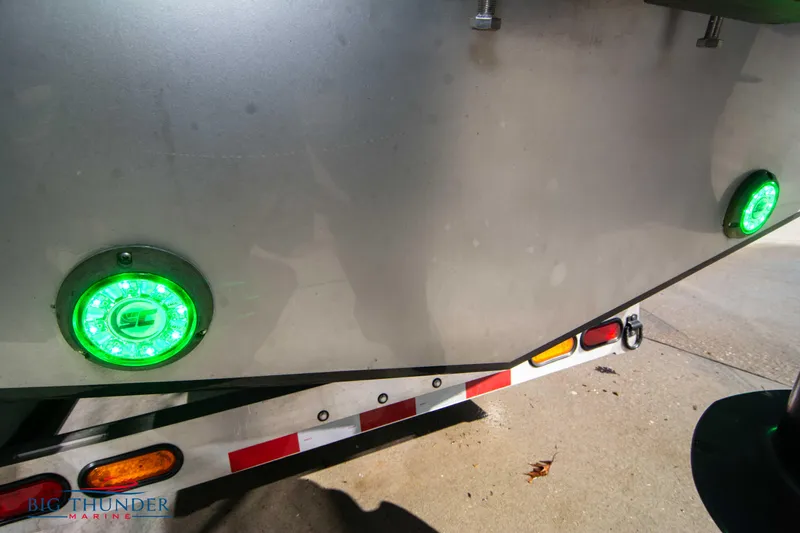  Yacht Photos Pics 2021 Fountain 38 SC boat with green LED lights on trailer.
