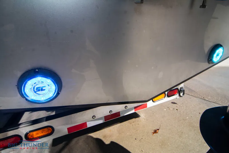  Yacht Photos Pics 2021 Fountain 38 SC boat on trailer with blue LED lights.