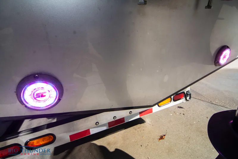  Yacht Photos Pics 2021 Fountain 38 SC boat on trailer with illuminated lights.