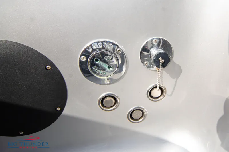  Yacht Photos Pics Close-up of waste disposal and fuel cap on 2021 Fountain 38 SC boat.