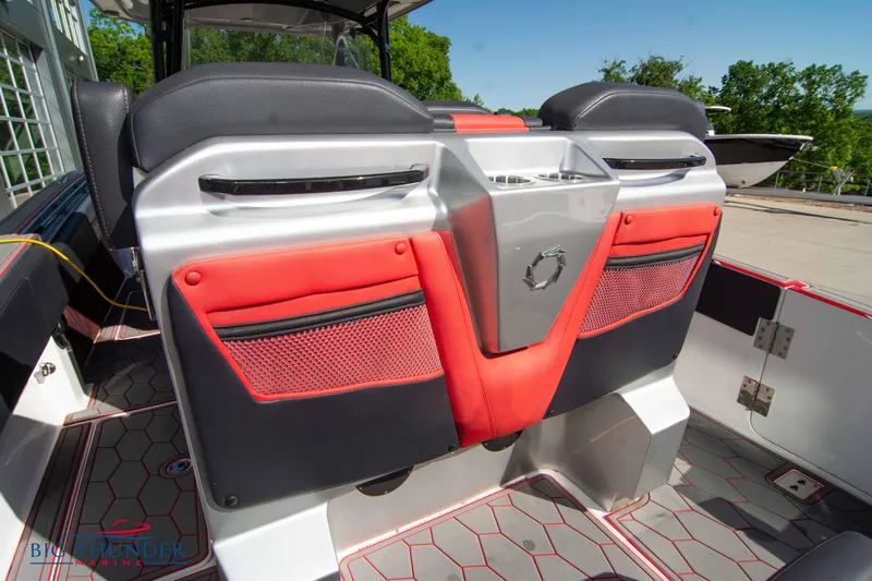  Yacht Photos Pics 2021 Fountain 38 SC boat interior with red and black seating and storage compartments.
