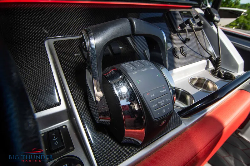  Yacht Photos Pics Close-up of the control panel of a 2021 Fountain 38 SC boat.