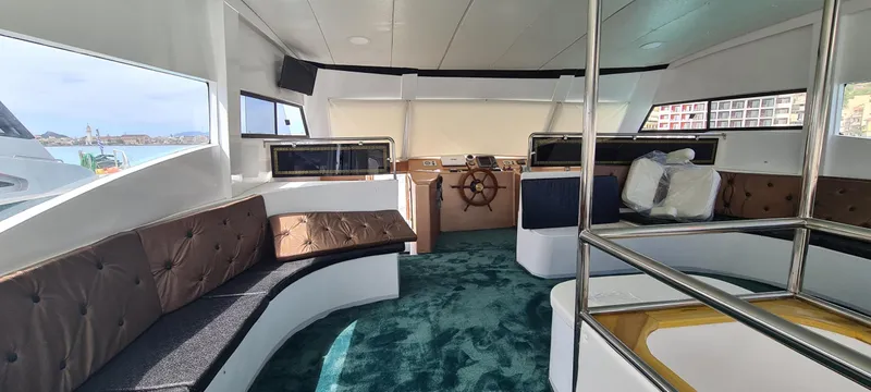  Yacht Photos Pics Interior of 2021 Jetcraft Passenger Boat with plush seating and modern helm.