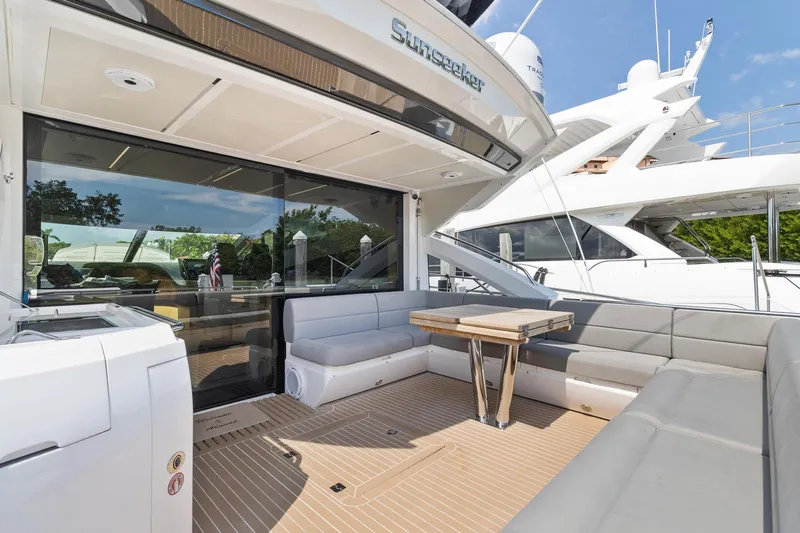Jolly Rogers Yacht Photos Pics Luxurious 2018 Sunseeker Predator 68 yacht with spacious outdoor seating area.