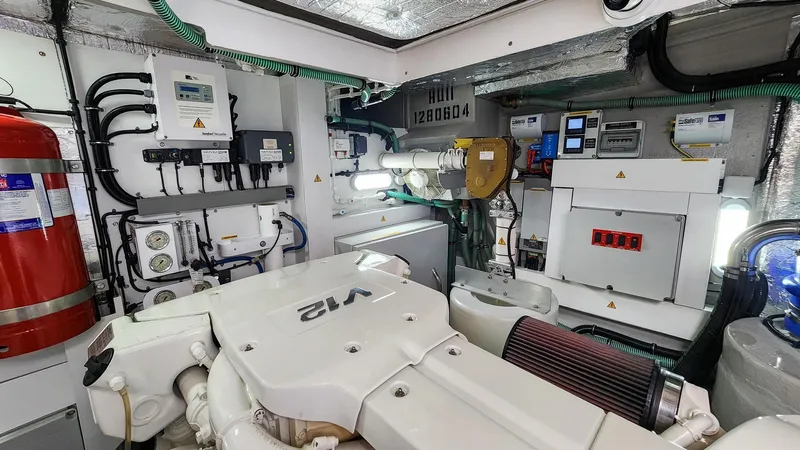 Jolly Rogers Yacht Photos Pics Engine room of 2018 Sunseeker Predator 68 yacht, featuring advanced machinery and equipment.