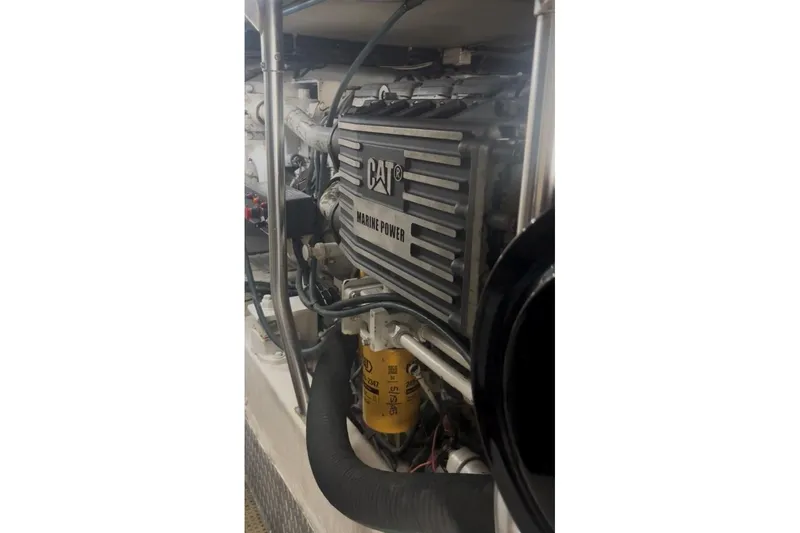 Offshore Obsession Yacht Photos Pics Engine of a 1998 Ocean 53 Convertible boat with CAT marine power.