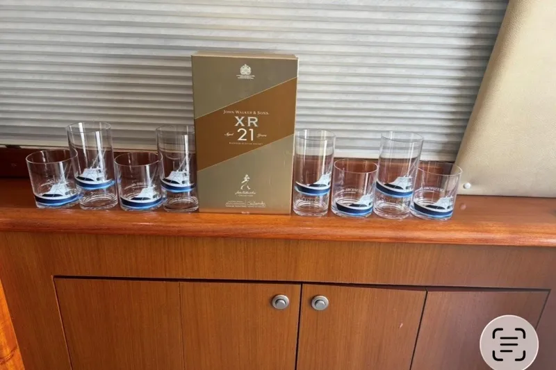 Offshore Obsession Yacht Photos Pics Whiskey box and glasses on Ocean 53 Convertible yacht, 1998 model.