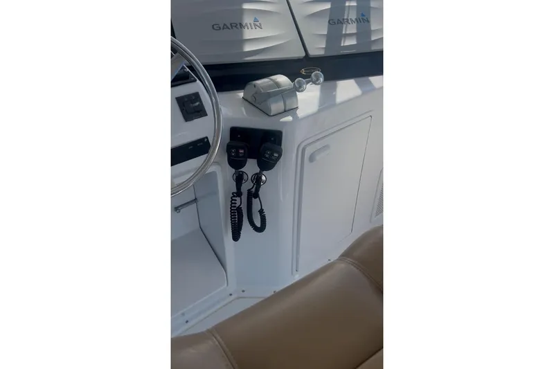 Offshore Obsession Yacht Photos Pics Interior of 1998 Ocean 53 Convertible boat with Garmin navigation equipment.