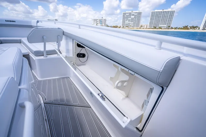  Yacht Photos Pics 2018 Everglades 435 Center Console boat interior with open storage compartment, ocean view, and modern design.