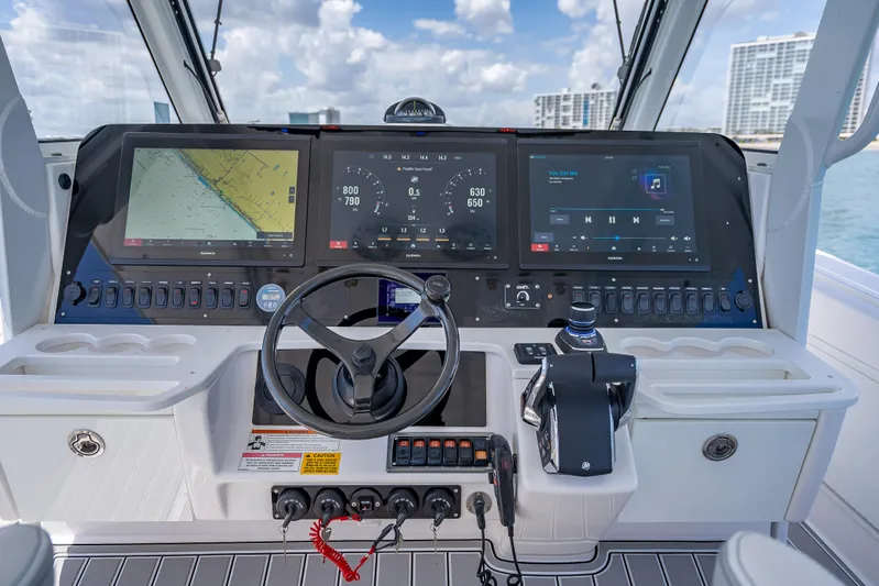  Yacht Photos Pics 2018 Everglades 435 Center Console dashboard with navigation and control systems.