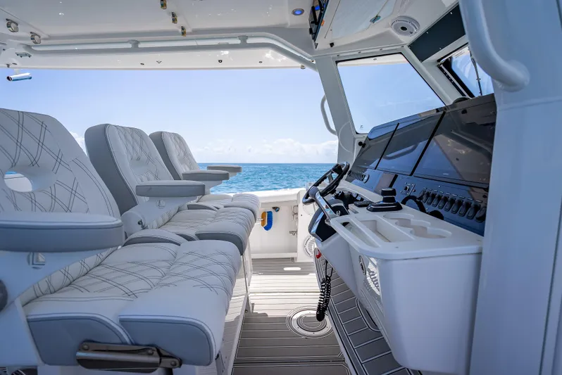  Yacht Photos Pics Interior of 2018 Everglades 435 Center Console boat with luxurious seating and advanced controls.