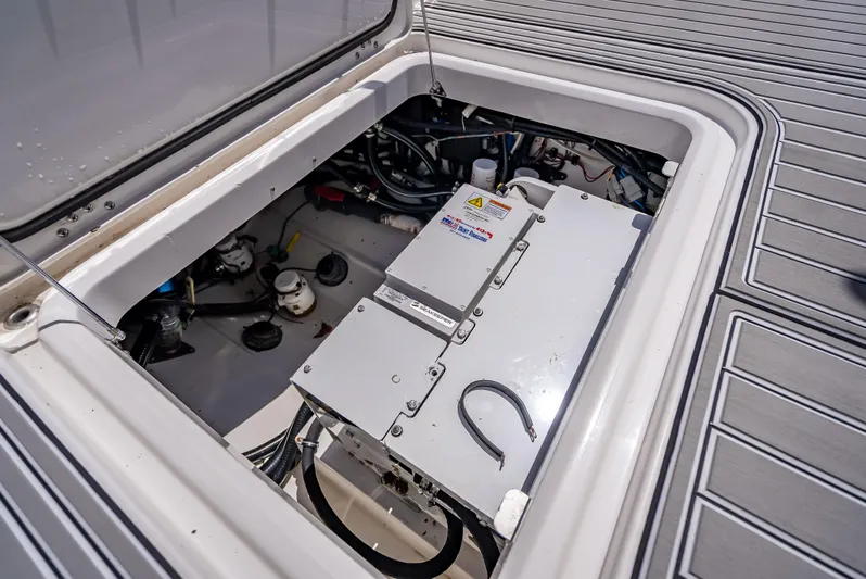  Yacht Photos Pics 2018 Everglades 435 Center Console engine compartment, showcasing mechanical components and wiring.