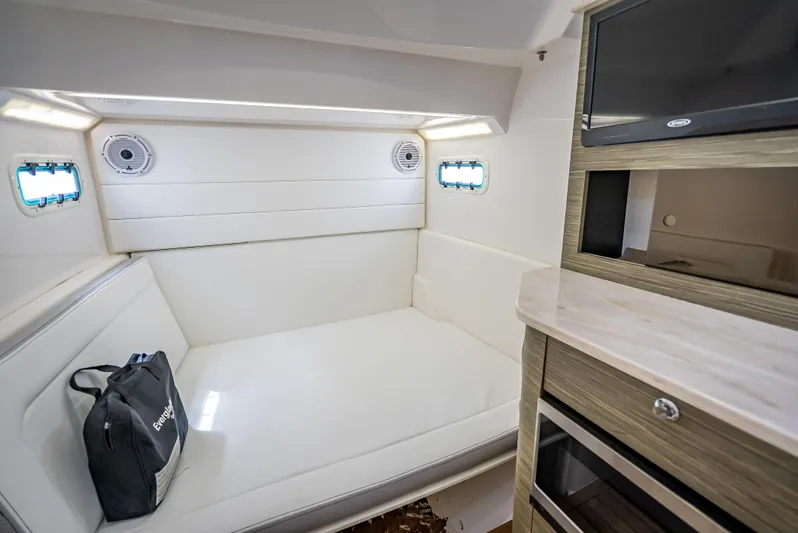  Yacht Photos Pics Interior cabin of 2018 Everglades 435 Center Console with seating and storage.
