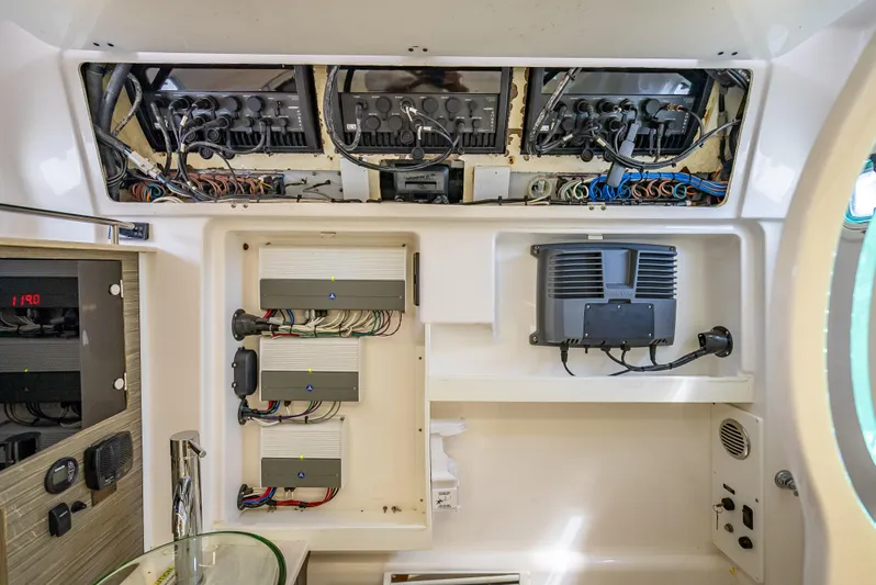  Yacht Photos Pics Electrical system inside a 2018 Everglades 435 Center Console boat, showcasing wiring and components.