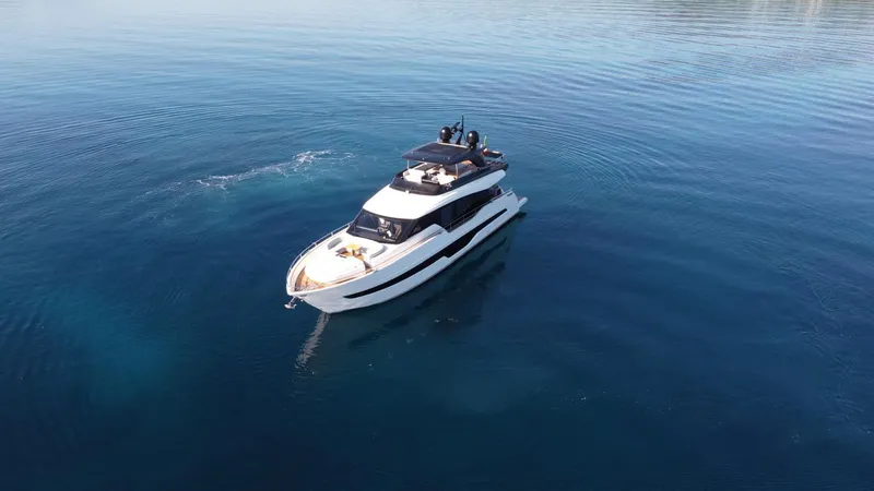 Victoria Yacht Photos Pics 2023 Cranchi Settantotto 78 yacht cruising on calm blue waters.