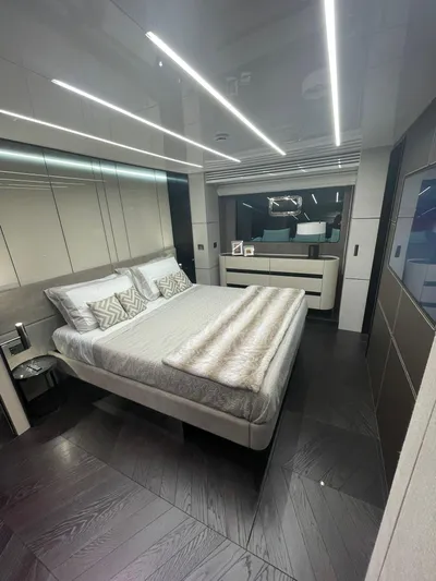 Victoria Yacht Photos Pics Luxurious bedroom interior of 2023 Cranchi Settantotto 78 yacht with modern design.