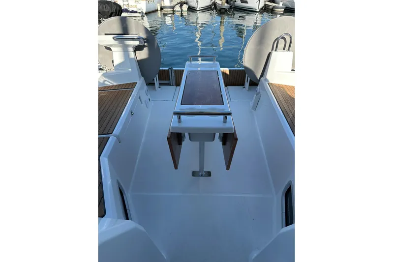 Claire Elise Yacht Photos Pics Cockpit view of 2024 Beneteau Oceanis 37.1 sailboat, featuring sleek design and modern amenities.