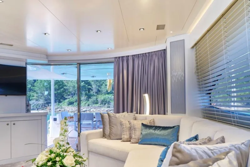 Samba Pa Ti Yacht Photos Pics Luxurious interior of 2004 Sunseeker 94 Yacht with elegant decor and comfortable seating.