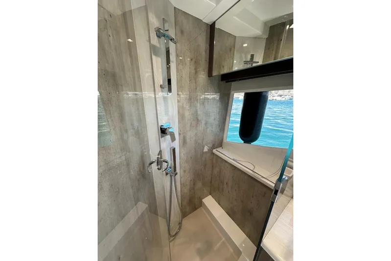  Yacht Photos Pics Luxurious shower area on 2023 Galeon 460 Fly yacht with ocean view.