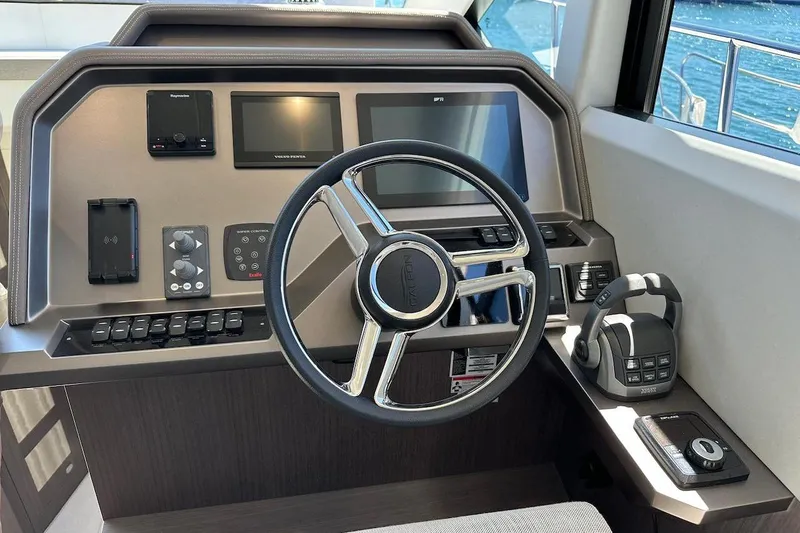  Yacht Photos Pics Helm of 2023 Galeon 460 Fly yacht with modern controls and steering wheel.