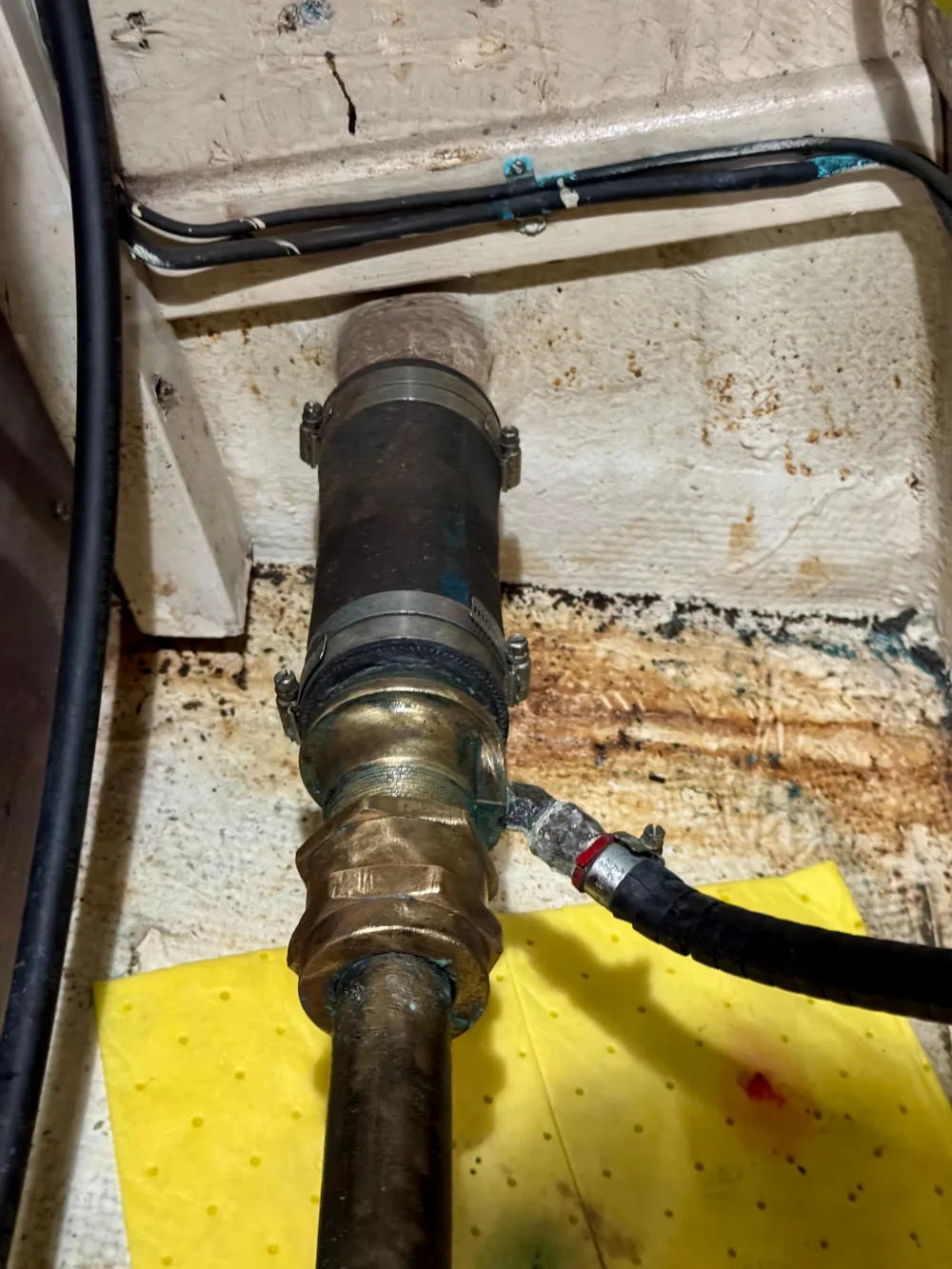 1979 Grand Banks Classic boat engine compartment with visible piping and wiring.