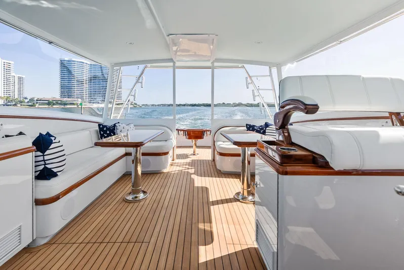 Rebel Yacht Photos Pics Luxurious 2000 Rybovich Sportfish yacht interior with elegant seating and ocean view.