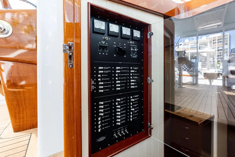 Rebel Yacht Photos Pics Electrical panel on a 2000 Rybovich Sportfish boat, featuring gauges and switches.